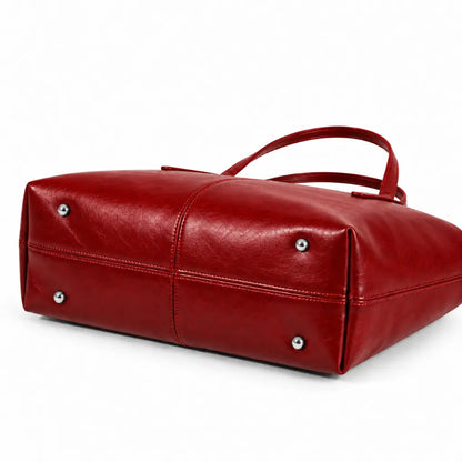Base da Bolsa Tote Élise Red com quatro apoios metálicos prateados