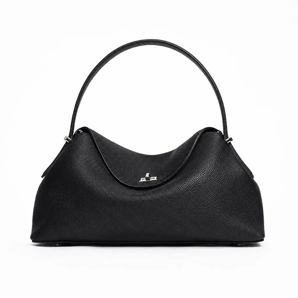 Bolsa Feminina em Couro Calla Preta com alça de mão slim arqueada e fecho giratório prata, foto de produto em fundo branco