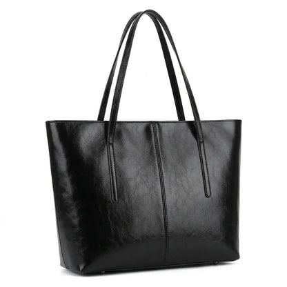 Foto de estúdio da Bolsa Feminina em Couro Tote Élise Preta com fundo branco isolado.