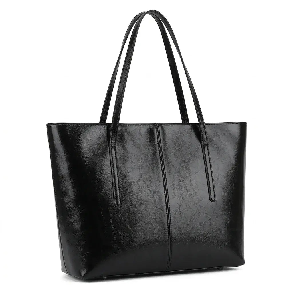 Foto de estúdio da Bolsa Feminina em Couro Tote Élise Preta com fundo branco isolado.