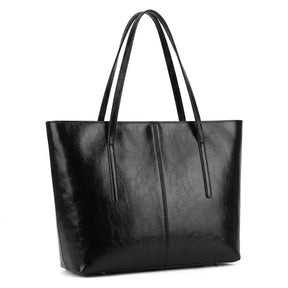 Foto de estúdio da Bolsa Feminina em Couro Tote Élise Preta com fundo branco isolado.