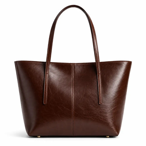 Bolsa Tote Élise Coffee em couro marrom, vista frontal em fundo branco